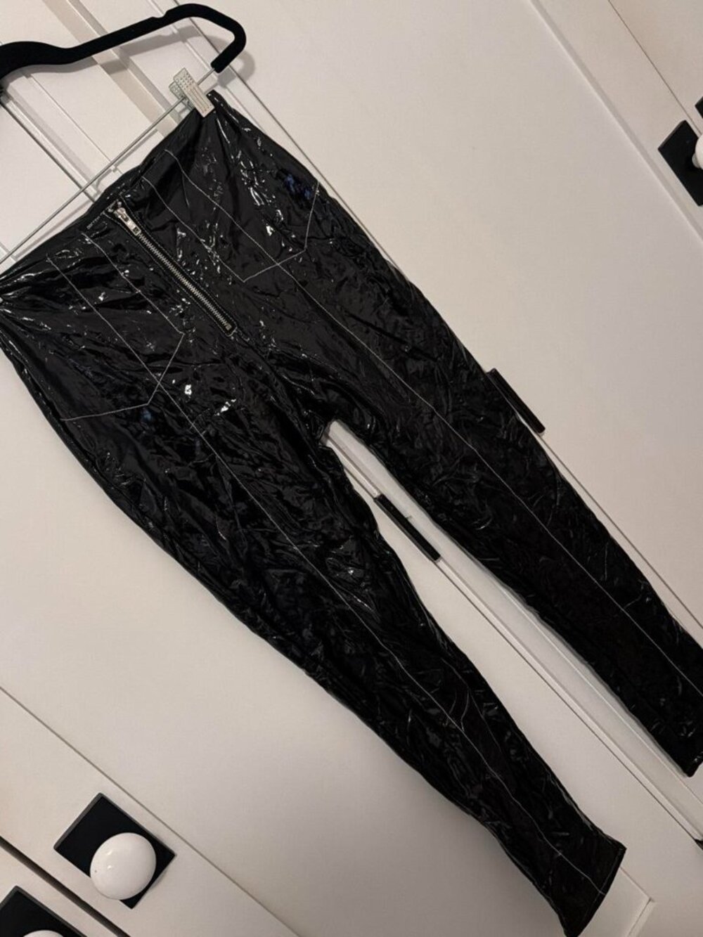 Black vinyl leggings with white paint stitch design
